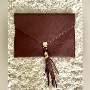 Big Buddha envelope tassel Clutch